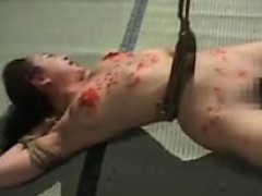 Wild Oriental chick gets tied up, covered in hot wax and ma